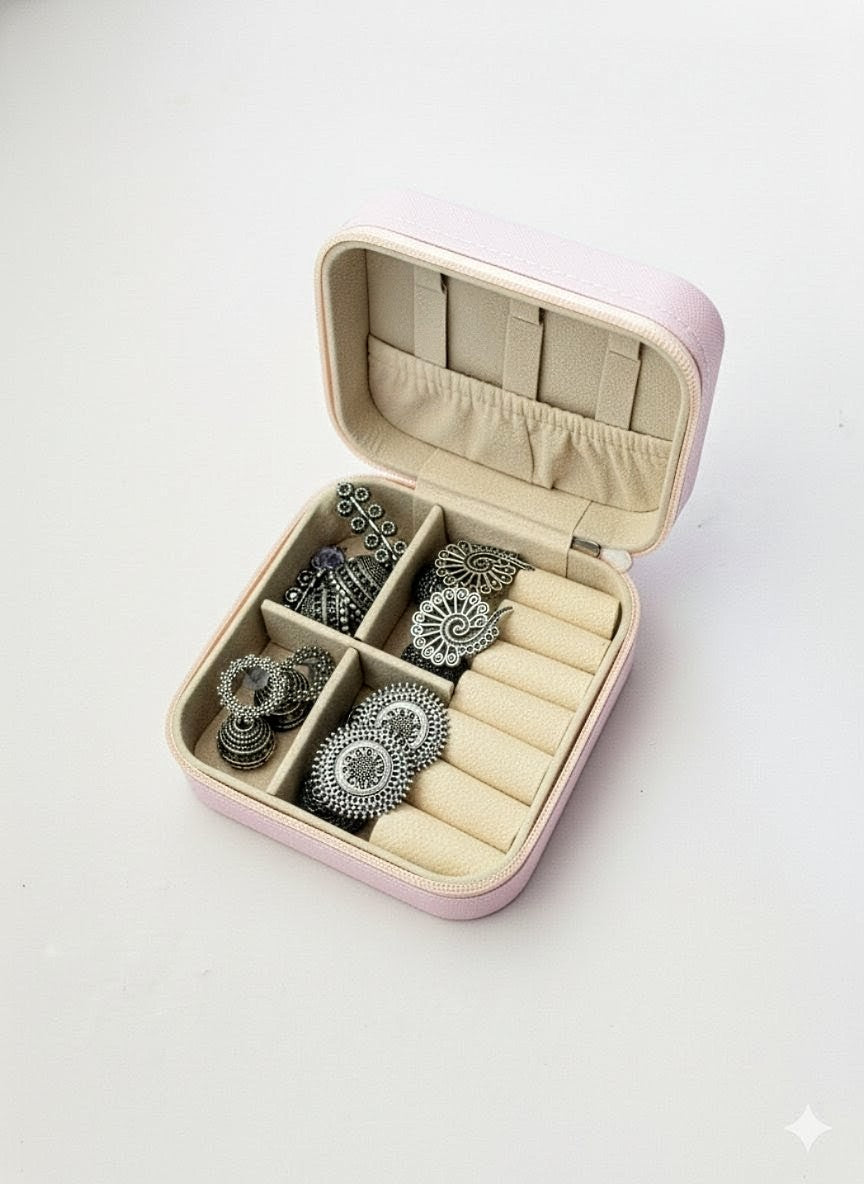 4 Oxidised earrings leather box